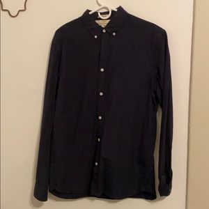 Medium regular fit navy blue button down shirt.